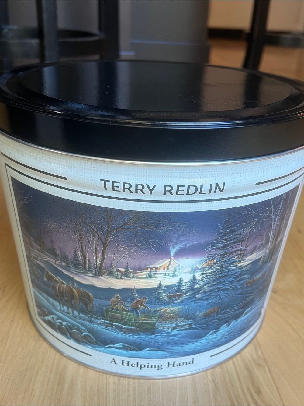 Terry Redlin's "A Helping Hand" Metal Collector's Tin 10"dia x 8"tall